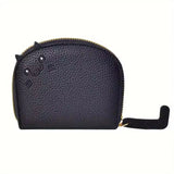 Black textured cat shaped  coin purse with a gold zipper on a white background