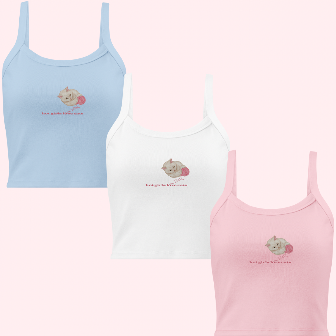 Blue white and pink variations of a tank top with a design on the front. Hot Girls Love Cats with a kitten playing with a ball of yarn