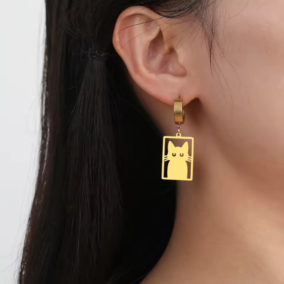 Stainless steel lightweight gold tone earrings with a cat silhouette in a rectangle